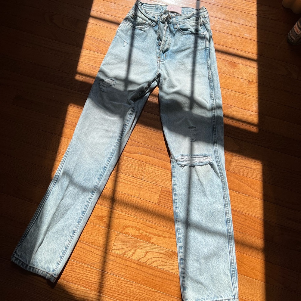 Revice denim jeans w/butt rip